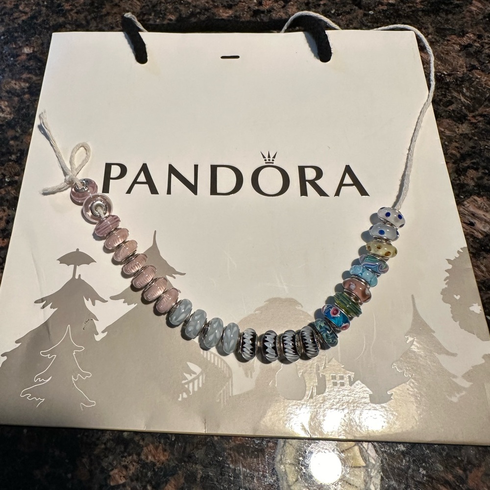 27 Pandora beads in great used condition